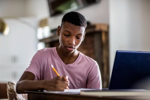 Student learning how to write